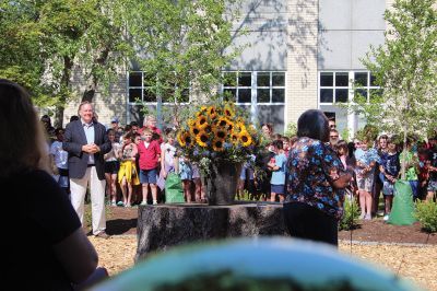 Children’s Memorial Garden
Where for many years stood a tall spruce tree at Sippican Elementary School is now a large stump at the center of a newly dedicated Children’s Memorial Garden honoring the lives of former students Marques Sylvia, Andrew Rego, Alexis Wisner and Cory Jackson. On June 14, Principal Marla Sirois led a celebration of the vision of former Principal Marylou Hobson (1990-2004) and the generosity and effort of Steve Gonsalves, Suzanna Davis, Margie Baldwin and the Pythagorean Lodge. Photos by Mick Colageo
