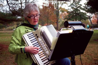 Salty Soiree
Luana Jøsvold plays the accordian during the Mattapoisett Land Trust’s Salty Soiree at Dunseith Gardens on Saturday, October 20, 2012.  Photo by Eric Tripoli.

