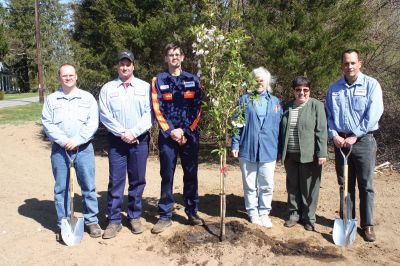 Earth Day 
From left: Will Campbell, Dave Ditata, Gary Stopka, Naida Parker, Sharon Lally and Mark Davis gather around the newly planted cherry tree at the Rochester Senior Center The cherry tree will grow to be approximately 30 feet tall, adding 1-2 feet in height each year.  The tree was given to the Rochester Senior Center by Covanta SEMASS as part of the Earth Day celebration. Photo by Katy Fitzpatrick
