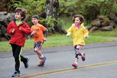 Tiara 5K Road Race
The Tiara 5K road race sponsored by Oxford Creamery has become a staple Mother’s Day tradition in Mattapoisett. The weather was damp and chilly, but still 441 runners turned out for the Mattapoisett village run to benefit the Women’s Fund of New Bedford. Photos by Colin Veitch
