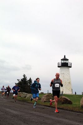 Mother’s Day Tiara 5k
Sunday’s wind and rain wasn’t stopping the hundreds who participated in the annual Mother’s Day Tiara 5k in Mattapoisett on May 10.  The storm brought strong wind and cold rain to the area, especially at the turn around Ned’s Point Lighthouse, dampening the day but not the sentiment behind the Women’s Fund of Southeastern Massachusetts’ largest annual fundraising event. Photos by Jean Perry
