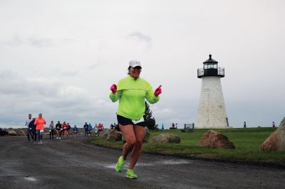 Mother’s Day Tiara 5k
Sunday’s wind and rain wasn’t stopping the hundreds who participated in the annual Mother’s Day Tiara 5k in Mattapoisett on May 10.  The storm brought strong wind and cold rain to the area, especially at the turn around Ned’s Point Lighthouse, dampening the day but not the sentiment behind the Women’s Fund of Southeastern Massachusetts’ largest annual fundraising event. Photos by Jean Perry
