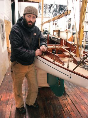 Concordia
Mattapoisett resident Tom Borges, an artist and ship's carpenter, poses with his one-third scale wooden model of a Concordia Yawl on display at the New Bedford Whaling Museum in the Jacobs Family Gallery. Photo courtesy of Arthur P. Motta.
