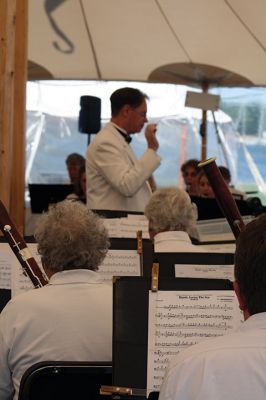 Tri-County Symphonic Band
The Tri-County Symphonic Band, under the direction of Philip Sanborn, hosted its 14th Annual Benefit Pops Concert beneath a breezy tent on the grounds of Tabor Academy on Sunday, June 12. This year’s concert had the appropriate theme “Celebration of the Sea,” and event-goers delighted in ocean-themed songs (and cupcakes) with Sippican Harbor as the backdrop. Photos by Jean Perry
