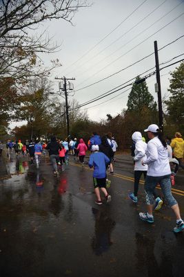 Turkey Trot 5K 
Sunday was the morning of the annual Turkey Trot 5K in the center of Marion. Yes, it was rainy and windy, but the 80 turkeys (we mean participants) that showed up anyway still enjoyed the scenic village trot. Photos by Glenn C. Silva
