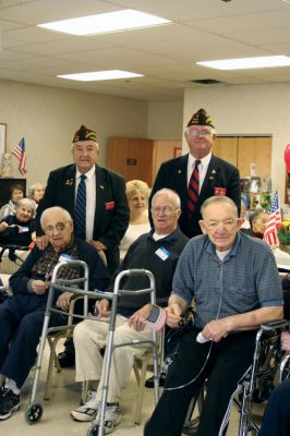 Veteran's Day
Veterans Roland Gendron and John Remedis shared their stories and insight to a room of flag-toting seniors at Sippican Healthcare Center on November 3 in honor of Veterans Day. Photos by Laura Pedulli
