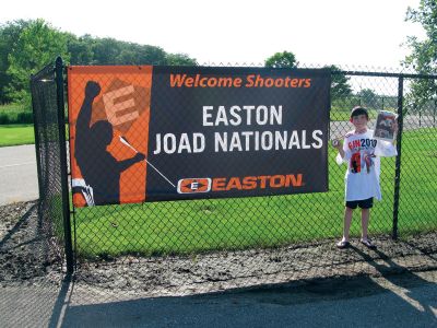 Easton JOAD Nationals
Mattapoisett sixth-grader Noah Tavares poses with The Wanderer at the Easton JOAD Nationals in Des Moines, IA. Mr. Tavares competed in the 2010 JOAD Outdoor Nationals in Des Moines, IA from June 24  27, ranking eighth overall, with a third-place finish in the team event. Photo courtesy of Kevin Tavares.
