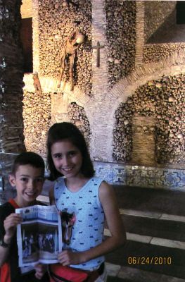 Chapel of Bones
Sienna and Alexander Wurl pose with a copy of The Wanderer at the Chapel of Bones in Evora, Portugal.
