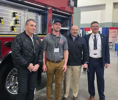 Rochester Fire 
From left: Rochester Fire Chief Scott Weigel; Cayce, Kentucky, Fire Chief Wade Adams; Rochester Fire Lieutenant Kevin Richard; and Fire Chiefs Association of Massachusetts President Michael Winn meeting on the second day of FCAM's annual 2022 Professional Development Conference at the DCU Center in Worcester. Photo courtesy of FCAM
