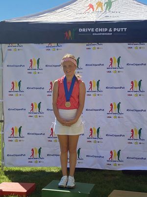 Willow Ruel
Willow Ruel, an 11-year-old fifth-grade student at Old Hammondtown School in Mattapoisett, takes the center spot on the podium at TPC River Highlands in Cromwell, Connecticut, after becoming one of 10 national finalists who will compete in the 10-11 age group of the Drive, Chip, & Putt Championship in April at Augusta National. Photos courtesy of Jenn Risio Ruel
