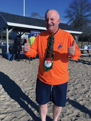 Christmas Day Swim
The 16th Annual Christmas Day Swim for Helping Hands and Hooves took place under bright blue cloudless skies and a balmy 43 degrees as dozens of families and friends took the plunge at Mattapoisett Town Beach. Photos by Marilou Newell

