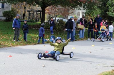 Soapbox Derby
Under the direction of Will Poirier, the Marion Pack 32 held their annual Soapbox Derby on Sunday, November 13 on Holmes Street. All the dens built their own cars this year. Photo by Felix Perez.
