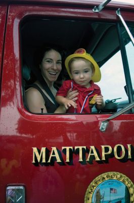 Heritage Days 2011
Heather Leclair-Perez enjoys a fire truck tour with her son Eamon at the 2011 Heritage Days celebration in Mattapoisett on August 6. Photo by Felix Perez.
