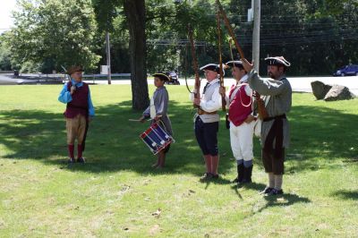 Heritage Days
Colonial-American re-enactors (left to right) Frank Matthew, Tim Smith, Chris Richard, Wayne Oliviera and Scott Smith demonstrate rifle firing techniques next to the Mattapoisett River as part of Mattapoisett's Heritage Days, which took place between Friday, August 7 and Sunday, August 9. Photo by Adam Silva
