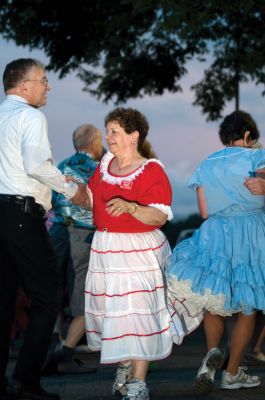 Square Dancing
It was good, ol fashioned, square-dancin fun at the Mattapoisett gazebo on July 10, 2010. As the sun set over Mattapoisett harbor, the Wareham Swingers dance group held a free, all-ages square dancing session. Photo by Felix Perez.
