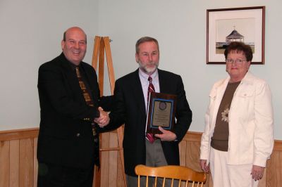 MASC Honors Andrews
Maurice Hancock (left), Immediate Past President of the Massachusetts Association of School Committees (MASC), and Ellen Furtado (right), President-Elect of the MASC, present the MASC's annual Community Leader for Public Education Award to Mattapoisett Selectman Raymond H. Andrews (center) for his efforts with the Center School and Old Hammondtown School Building Projects. (Photo by Kenneth J. Souza).
