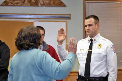 Oath of Office
Mattapoisett's Deputy Fire Chief Andrew Murray is sworn in by Town Clerk Barbara Sullivan as the town's Interim Fire Chief in the wake of longtime Fire Chief Ronald Scott's recent retirement. Chief Murray took the oath before a packed crowd during a recent Mattapoisett Selectmen's meeting that included many family members and friends. (Photo by Kenneth J. Souza).
