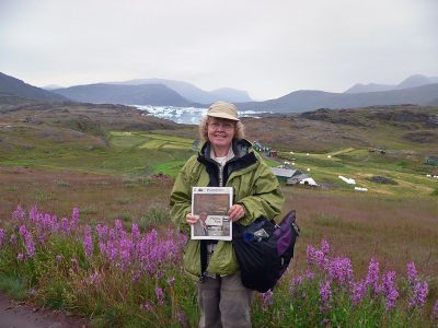 Going to Greenland
Fairhaven Library Director Carolyn Longworth poses with a copy of The Wanderer during a recnet trip to Tassiusaq, Greenland. (Photo courtesy of Carolyn Longworth).
