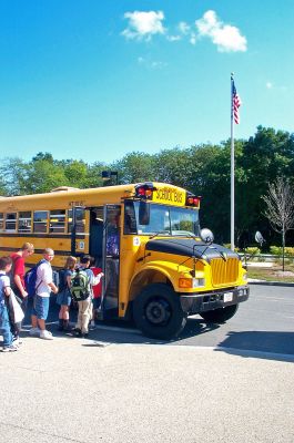 Back to School
Summers over! Students throughout the tri-town area returned to school as early as last week. Here students file onto the bus just outside Old Hammondtown School in Mattapoisett at the conclusion of another school day. All schools in the Old Rochester Regional School District have resumed classes for the 2005-2006 school year. (Photo by Kenneth J. Souza).
