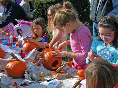 Pick A Pumpkin
Children hollow out pumpkins and prepare to carve them into traditional Halloween Jack-O-Lanterns during the Mattapoisett Historical Societys Fall Celebration on Sunday, October 15 at the Mattapoisett Historical Museum and Carriage House. In the tradition of a harvest celebration, pumpkins carvers were also given tips on how they could prepare the pumpkin seeds to and toast them in the oven. (Photo by Robert Chiarito).
