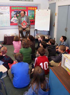 Readers in Rochester
Rochester Selectman Dan McGaffey reads to students in Mr. Davignons fourth grade class at Memorial School during last weeks Reading is Fundamental guest reader program. Mr. McGaffey also took the opportunity to give the class a quick civics lesson and explained the differences between the town and city forms of government within the Commonwealth of Massachusetts. (Photo by Robert Chiarito).

