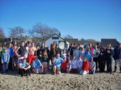 Helping Hooves
About 60 brave souls turned out at the Mattapoisett Town Beach for a chilling benefit Christmas Swim to benefit Helping Hands and Hooves. The event raised about $1,500 which will pay for 43 lessons at the Mattapoisett-based facility. (Photo courtesy of Debbi Dyson).
