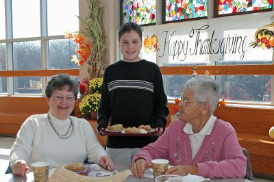 ORR Thanksgiving Dinner
(L. to R.) Shirley Oliver and Dorothy Tuttle of Rochester enjoy their homemade apple pie, served by Ms. Olivers grandson, Ethan Anderson of Marion, during the recent Thanksgiving Dinner for Seniors held at Old Rochester Regional Junior High School. The annual tradition is organized and served, free of charge, to seniors in Mattapoisett, Marion and Rochester. (Photo courtesy of Jane McCarthy).
