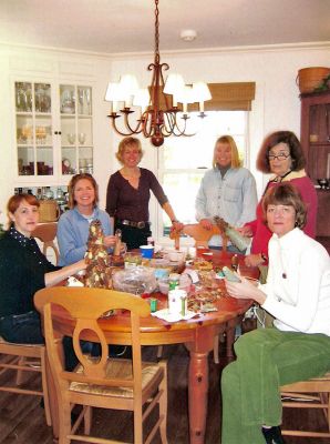 Christmas Boutique
The Marion Garden Discussion Group is busy preparing for their annual Christmas Boutique, Down to Earth, to be held on Saturday, December 8 beginning at 9:30 am in the Saint Gabriels Church Library in Marion. Garden Club members (l. to r.) Joanne Hannan, Laurie Fearing, Kym Lee, Connie Dolan, Betty Cooney and Betsy Fallon gather at the home of Kym Lee to create decorations using cones, nuts and twigs.
