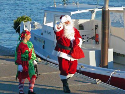 Sailing Santa
After arriving in Marion via boat at Island Wharf, Santa Claus greeted the crowd awaiting him before participating in the town's 2006 Annual Holiday Village Stroll. (Photo by Robert Chiarito).
