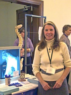 Get Well in Marion
The Marion Institute sponsored their annual Wellness Day Community Health Fair at the Marion Music Hall on Saturday, January 27. The event was a gathering of those seeking to find ways to live a healthier lifestyle and featured a wide array of wellness practitioners from throughout the South Coast area. Here Alicia Crabbe of Marion shows a display on chiropractic health. (Photo by Robert Chiarito).

