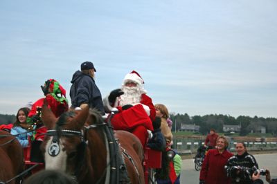 Marion Christmas Stroll 2007
Santa climbs aboard a horse-drawn carriage during Marion's Annual Christmas Village Stroll held on Sunday, December 9, 2007. (Photo by Robert Chiarito).
