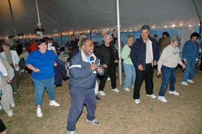 150th Block Party
Mattapoisett's 150th Sesquicentennial Celebration "Block Party" was held on Friday night, August 10 in Shipyard Park under the tent, despite inclement weather. (Photo by Tim Smith).
