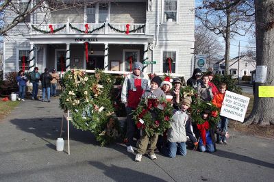 Holiday in the Park
Members of Mattapoisett Boy Scout Troop 53 sold Christmas wreaths and decorations outside Town Hall during Mattapoisett's Annual Holiday in the Park held on Saturday, December 6, 2008 in Shipyard Park. (Photo by Robert Chiarito).
