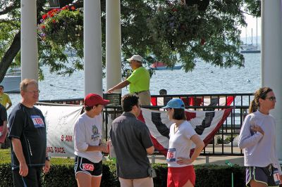 2007 Mattapoisett July 4 Road Race
Mattapoisett July 4 Road Race organizer Danny White makes a few announcements in Shipyard Park before the start of the 37th running of the five-mile race which drew a record-setting 988 registrants this year. (Photo by Kenneth J. Souza).

