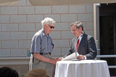 Water Works
Lifelong Mattapoisett resident Howard Tinkham accepts a citation from State Representative William Straus during the dedication of the Mattapoisett River Valley Water District's Treatment Plant on Friday, May 30. Mr. Tinkham generously offered part of his family's land for the facility. (Photo by Kenneth J. Souza).
