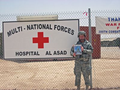 Mattapoisett Major
Major Mark J. Tenerowicz, USAR, MC, of Mattapoisett poses with a copy of The Wanderer at the front gate of the the 399th Combat Support Hospital in Al Asad, Iraq where he serves as a Major in the the US Army Reserve Medical Corps. (06/07/07 issue)
