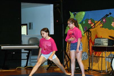 Talent to Spare
Old Hammondtown School students Hannah Rose and Serena Jasakolka perform gymnastics during the school's Talent Show held on Tuesday, April 29 in Mattapoisett. (Photo by Kenneth J. Souza).
