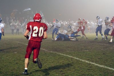 Bulldog Win
On a foggy night where it was difficult to see across the field, members of Old Rochester Regional High Schools Bulldog football team faced off against the Wareham Vikings on ORRs home turf. The competitive November 14 game ended up being an important win for the Bulldogs, 23-22, thanks to a 21-yard field goal from ORR junior Zach Choquette (#20, right). (Photo by Robert Chiarito).
