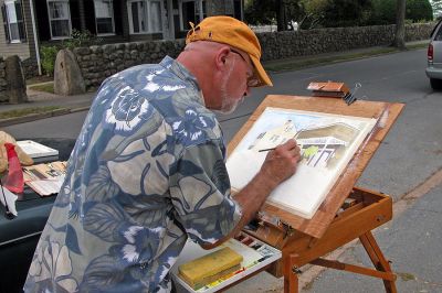 Fresh Paint
Artist Lee Jones works on a watercolor rendering of the Mattapoisett Inn on Water Street during the fifth annual "Fresh Paint" event held on Tuesday, July 17 to benefit the Mattapoisett Public Library. (Photo by Kenneth J. Souza).
