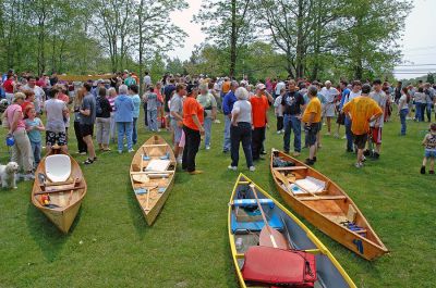 Finish Line
Handbuilt wooden boats which have completed the 11-mile trek down the Mattapoisett River are lined up near the finish line during the 2007 Annual Memorial Day Boat Race from Rochester to Mattapoisett. (Photo by Tim Smith).
