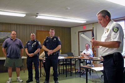 Officers Commended
(L. to R.) Rochester Dispatcher Jonathan Weedall, Officer John Barnes, and Officer Sean Crook were recently commended by Police Chief Paul Magee (far right) and the Board of Selectmen for helping to capture an armed and dangerous bank robbery suspect on June 1 in Rochester. (Photo by Kenneth J. Souza).
