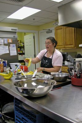 Cooking Class
Linda Medeiros of Rochester works on her "Bananas Foster Stir-Fry" recipe during a recent demonstration at the Rochester Senior Center on Monday, November 13. (Photo by Kenneth J. Souza).
