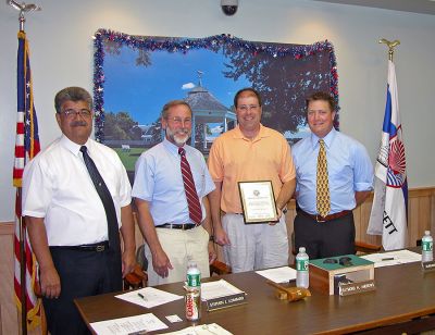 Rocha Recognized
Members of the Mattapoisett Board of Selectmen recently presented Bruce Rocha (third from left) with a Certificate of Appreciation for donating the labor to fix and repair the roof of the landmark gazebo at Shipyard Park and for doing similar work at Veterans' Park on Ned's Point. Flanking Mr. Rocha are (l. to r. ) Selectman Steve Lombard, Selectman Ray Andrews, and Selectman Jordan Collyer. (Photo by Kenneth J. Souza).


