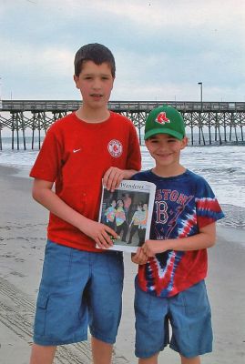 Beach Bound
Red Sox fans Ross and Brady Garcia pose with a copy of The Wanderer during a recent trip to Myrtle Beach with their family. (06/07/07 issue)
