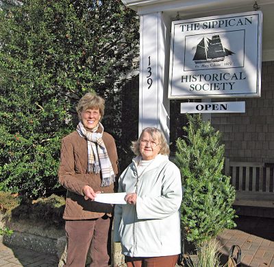 Curtain Call
Sippican Historical Society President Judith Rosbe presents a check to Phyllis Washburn of Marions Music Hall Advisory Committee. The $3,000 donation will be used for the purchase of a new back curtain for the Music Halls stage. (Photo courtesy of Kimberly A. Teves).

