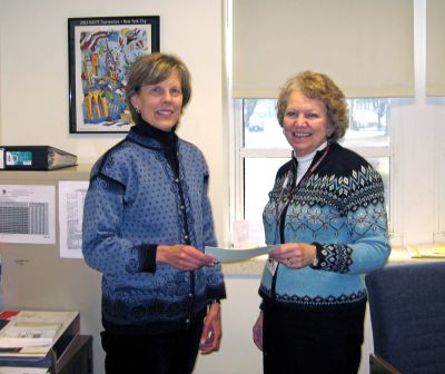 Early Childhood Donation
Tri-Town Early Childhood Coordinator Jane Taylor accepts a $350 donation from Sippican Historical and Preservation Society (SHPS) President Judy Rosbe. The donation will help make it possible to provide qualified teachers for the offices programs, which are dependent almost exclusively on grant monies. 
