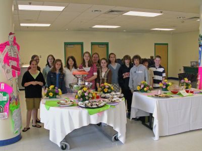 Senior Spring Fling
Seniors from Mattapoisett, Marion and Rochester participated in the eighth annual Spring Fling dance party on Sunday, May 6 in the Sippican School cafeteria. The event was hosted by the Marion Council on Aging (COA) with a group of student volunteers from Old Rochester Regional Junior High School (pictured here) who not only helped serve refreshments, but also joined their elders on the dance floor for some contemporary and traditional dances. (Photo by Robert Chiarito).

