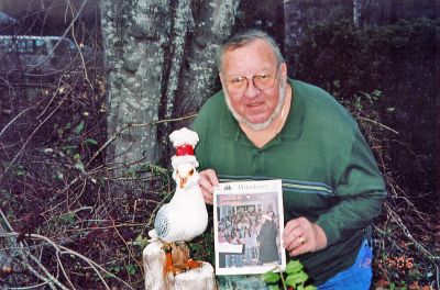 Seagull Santa
Dan Sullivan of Mattapoisett poses with a copy of The Wanderer alongside his wood-carved seagull decked in a Santa hat for the holiday. (Photo courtesy of Dan Sullivan).
