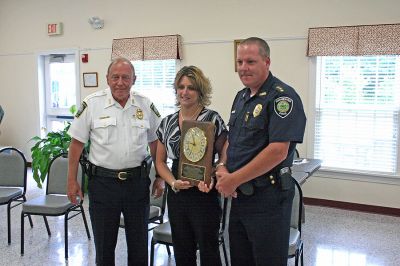 Dispatcher Honored
Rochester Chief Dispatcher Tracy Eldridge received the Thirteenth Annual Jeff Grossman 9-1-1 Telecommunicator of the Year Award on June 29 and is seen here flanked by Ned Merrick, Chief of the Plainville Police Department and a longtime colleague of Mr. Grossman, and Rochester Police Chief Paul Magee. (Photo by Robert Chiarito).
