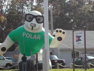 Polar Bear Sighting
The Polar seltzer bear recently made a visit to the Harding Sails facility in Marion to be fitted with a new pair of sunglasses. The sunglasses are a part of Polar's ad campaign regarding a six million dollar solar array that they are installing on the roof of their factory in Worcester. Photo courtesy of Graham Quinn.
